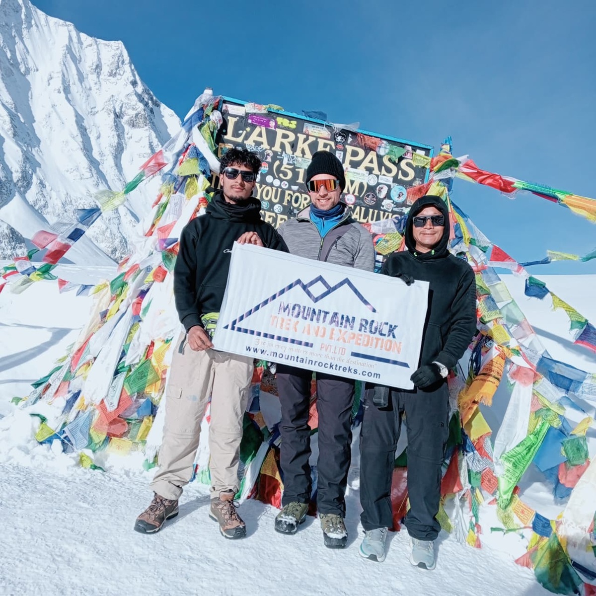 One of our successful MRT team members crossing and reaching Larke La Pass in autumn (September 2026) and posing for a photo