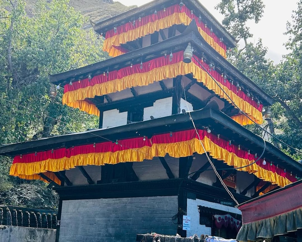 The golden Muktinath Temple surrounded by 108 stone water sprouts in the Mustang region.